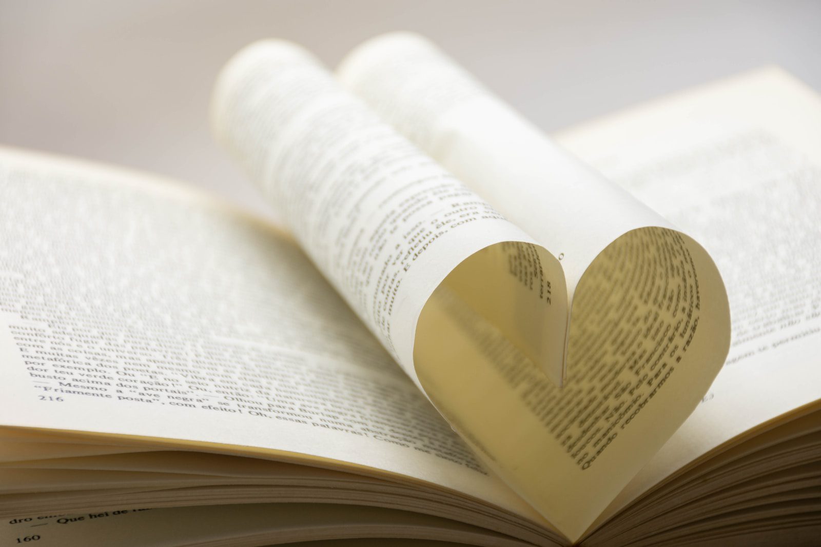 white book page with yellow and white plastic bottle